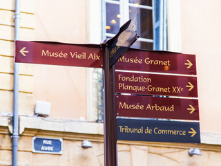 Aix-en-Provence, FRANCE, on March 8, 2018. Tables specify the direction to city sights