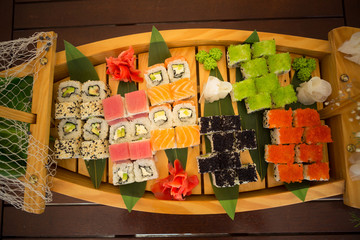 Naklejka na ściany i meble set of rolls on the ship. set sush. Japanese food