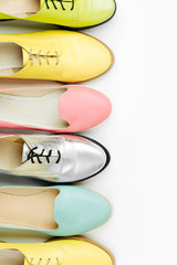Stylish female spring or autumn shoes in various colors. Beauty and fashion concept. Flat lay, top view