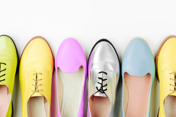 Stylish female spring or autumn shoes in various colors. Beauty and fashion concept. Flat lay, top view