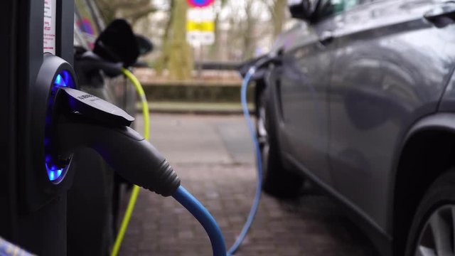electric car charging on parking in Amsterdam.