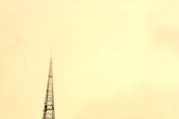 KCPTV transmitter tower against orange sky