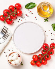 Tomatoes, basil, mozzarella cheese. Caprese salad ingredients