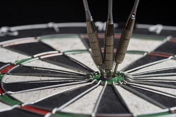 three darts in the center