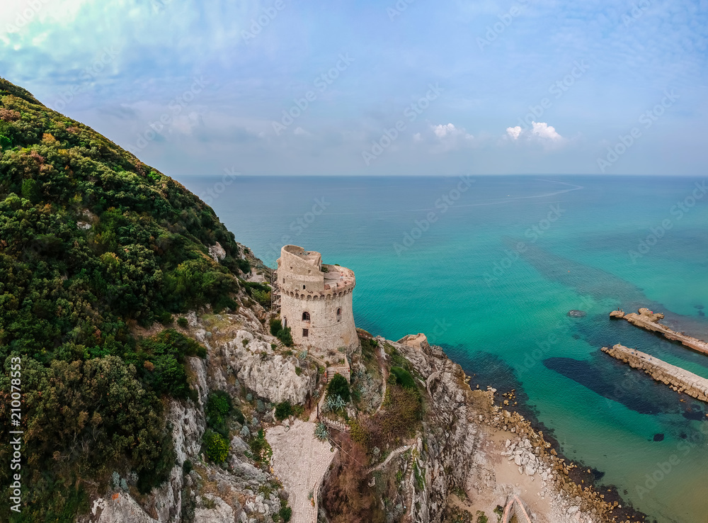 Wall mural panoramic landscape with ancient tower in sabaudia, lazio, italy. scenic resort town village with ni