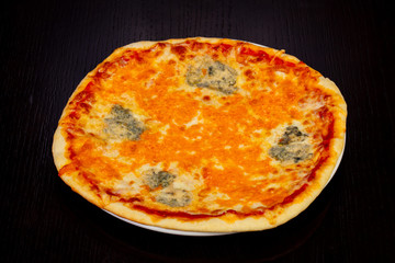Delicious 4 cheese pizza