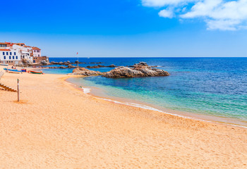 Sea landscape with Calella de Palafrugell, Catalonia, Spain near of Barcelona. Scenic fisherman village with nice sand beach and clear blue water in nice bay. Famous tourist destination in Costa Brava