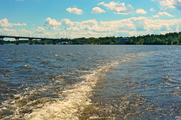 The track of the motor ship on the river.