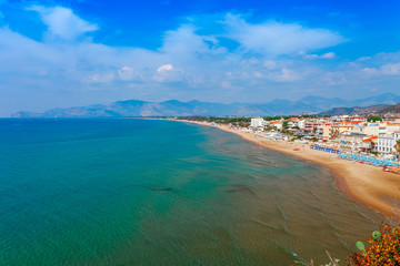 Sea landscape with Sperlonga, Lazio, Italy. Scenic resort town village with nice sand beach and clear blue water in picturesque bay. Famous tourist destination in Riviera de Ulisse