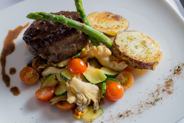 Tenderloin Three Peppers on a White plate
