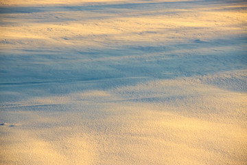 Fototapeta na wymiar Clean snowy surface in a frosty day.