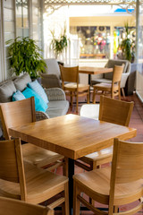 Fototapeta na wymiar abstract cafe or restaurant interior, no guests