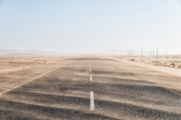 Sand Storm Across Lonely Desert Road in Southern Namibia taken in January 2018