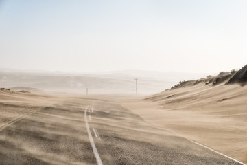 Sand Storm Across Lonely Desert Road in Southern Namibia taken in January 2018