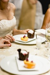 Obraz na płótnie Canvas Cold desserts and wedding cakes