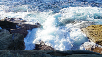 Waves hitting rocks 