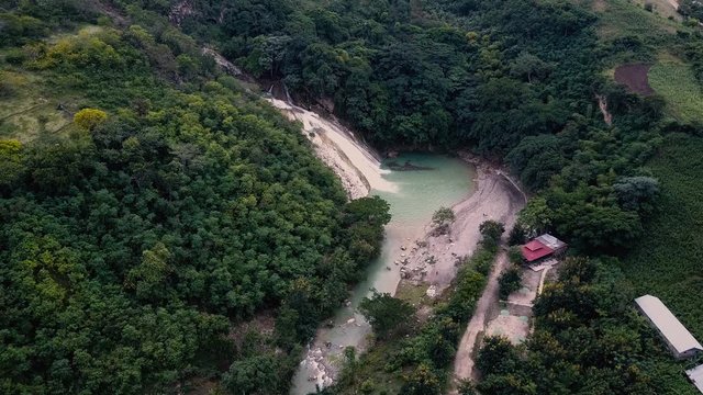 Aerial Drone Flies High over Haitian Waterfall