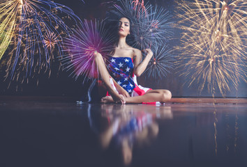 Beautiful, sexy, young brunette woman in flag ,4th july concept. - obrazy, fototapety, plakaty