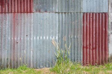 Colorful patterned corrugated iron wall