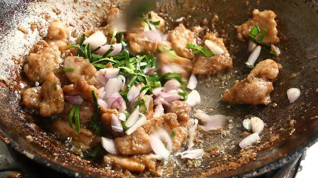 Frying chopped pork with shrimp paste in pan , Thai food