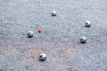 Petanque ball sport playing game and a small wood jack