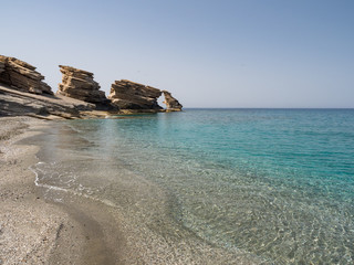 Triopetra rocks and blue water, Crete, Greece. Suitable to be used like a background. June, 2018