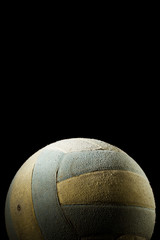 Close up of Old Volleyball on Black Background