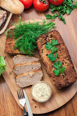 Traditional delicious meat pate with chicken liver on cutting board