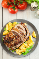 Roasted pork roll stuffed with other meat