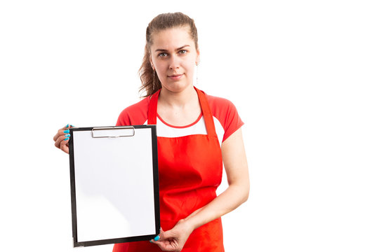  Female supermarket or retail employee presenting empty clipboard.
