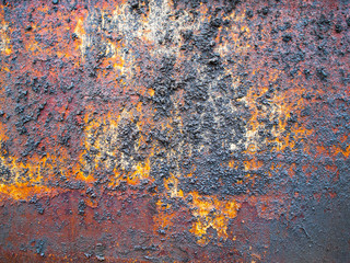 rusty painted metal with solution spray