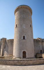 Fototapeta na wymiar Old fortified castle high above Palma in Majorca