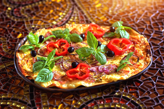 Alsatian cake with olives pepper and bacon