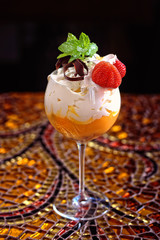 sweet mousse dessert with strawberries and cream