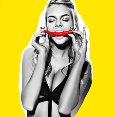 fashion portrait of blond model in summer black swimwear clothes posing near white wall, biting red...