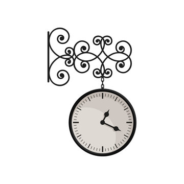 Hanging vintage clock with black metal frame and white dial. Street decor element. Mechanical device for measuring time