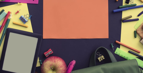 Banner Concept back to school apple backpack stationery on black background.