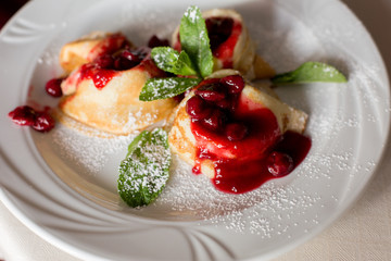 raspberry brownies. cakes with berries on a white plate. confectionery. candy