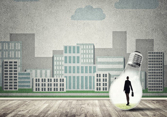 Businesswoman trapped in bulb