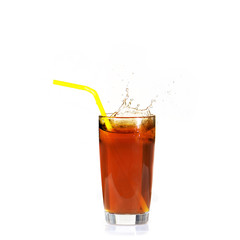 A slice of lemon flies into the refreshing tea. Splashes and drops.