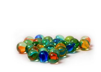 Colored marbles isolated in white background