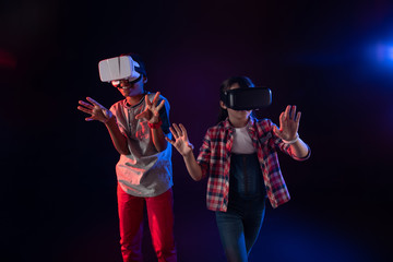 Our leisure. Alert long-haired girl smiling and playing with her best friend