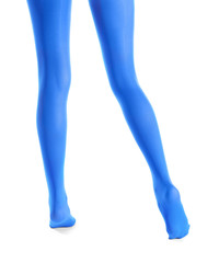 Legs of beautiful young woman in tights on white background