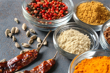 Bowls with various spices on table