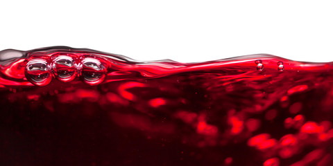 Red wine on white background © Igor Normann