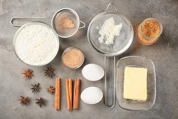 Fototapeta na wymiar Ingredients for cooking cinnamon buns on table, top view