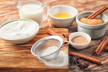 Ingredients for cooking cinnamon buns on table
