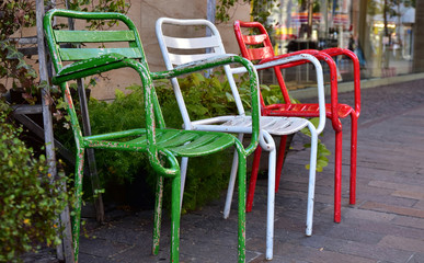 Fototapeta na wymiar Scenery of the street of the town with the colorful chair