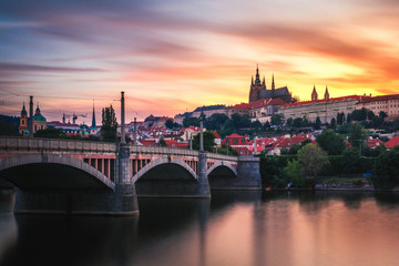 Beautiful golden view of the River Vltava and Manes Bridge after the sunset, Prague, Czech Republic, Europe
