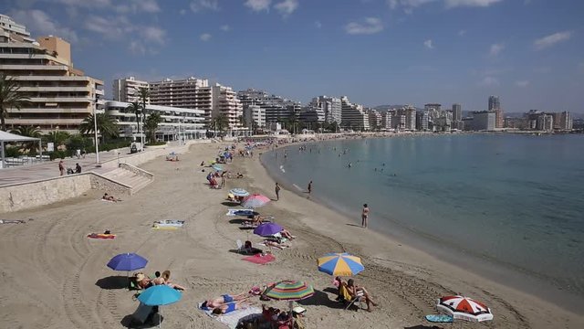 Costa Blanca beach in Spain Levante La Fossa playa Calpe with people